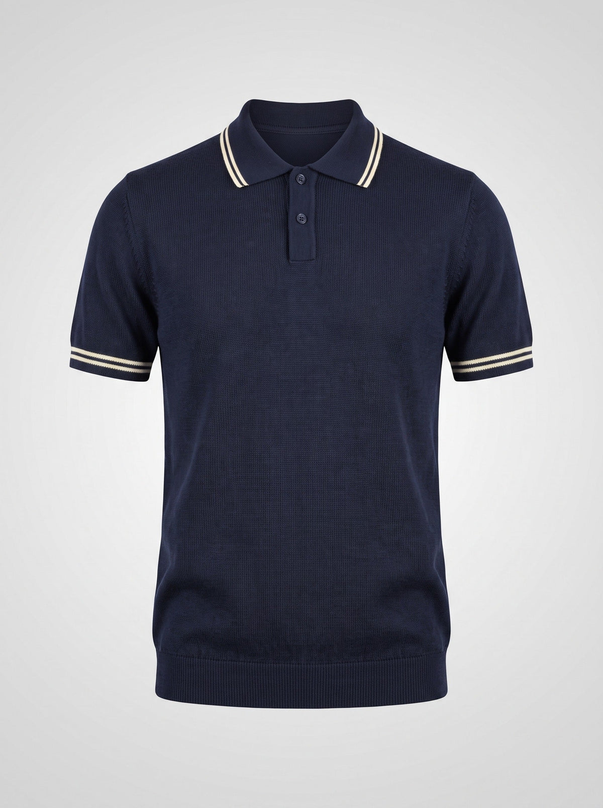 The Pavilion navy knit polo shown front on, twin ecru stripes along the collar and doubled at each cuff