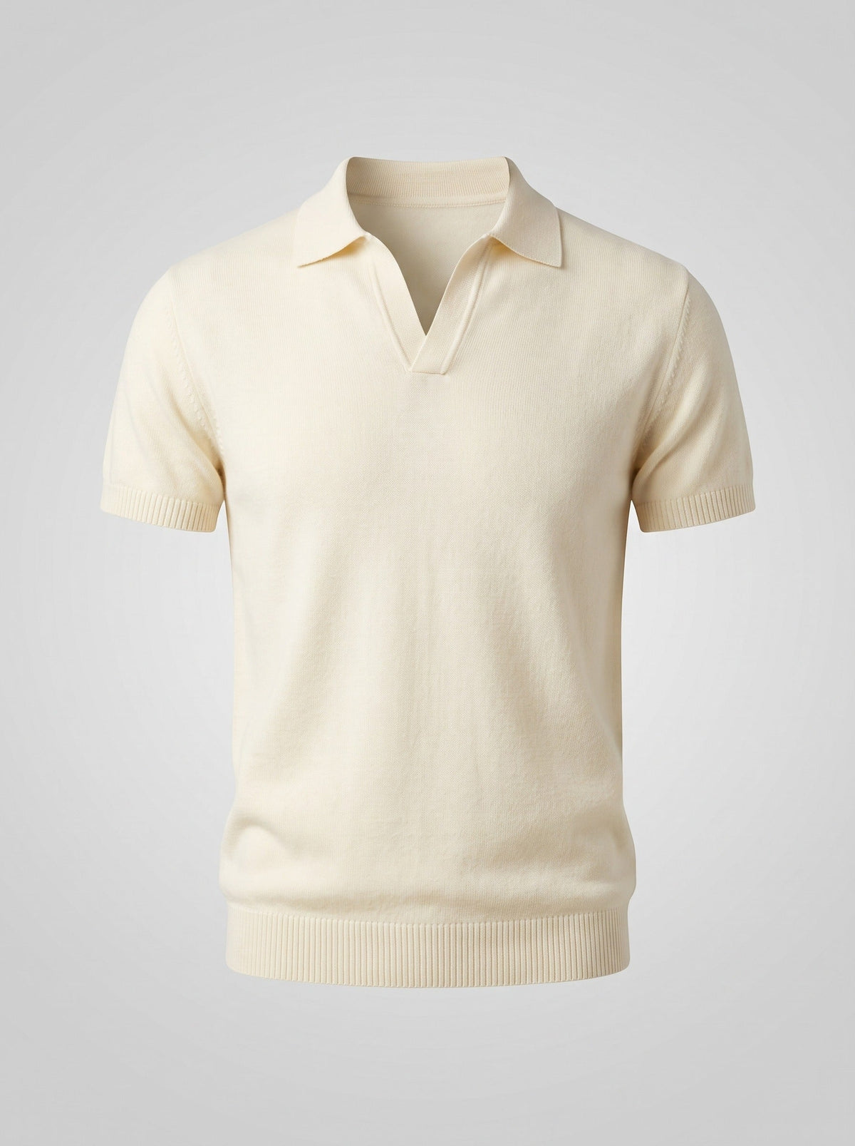 The Plain Hour ecru knit polo shown flat, open V placket with no buttons and ribbed cuffs and hem