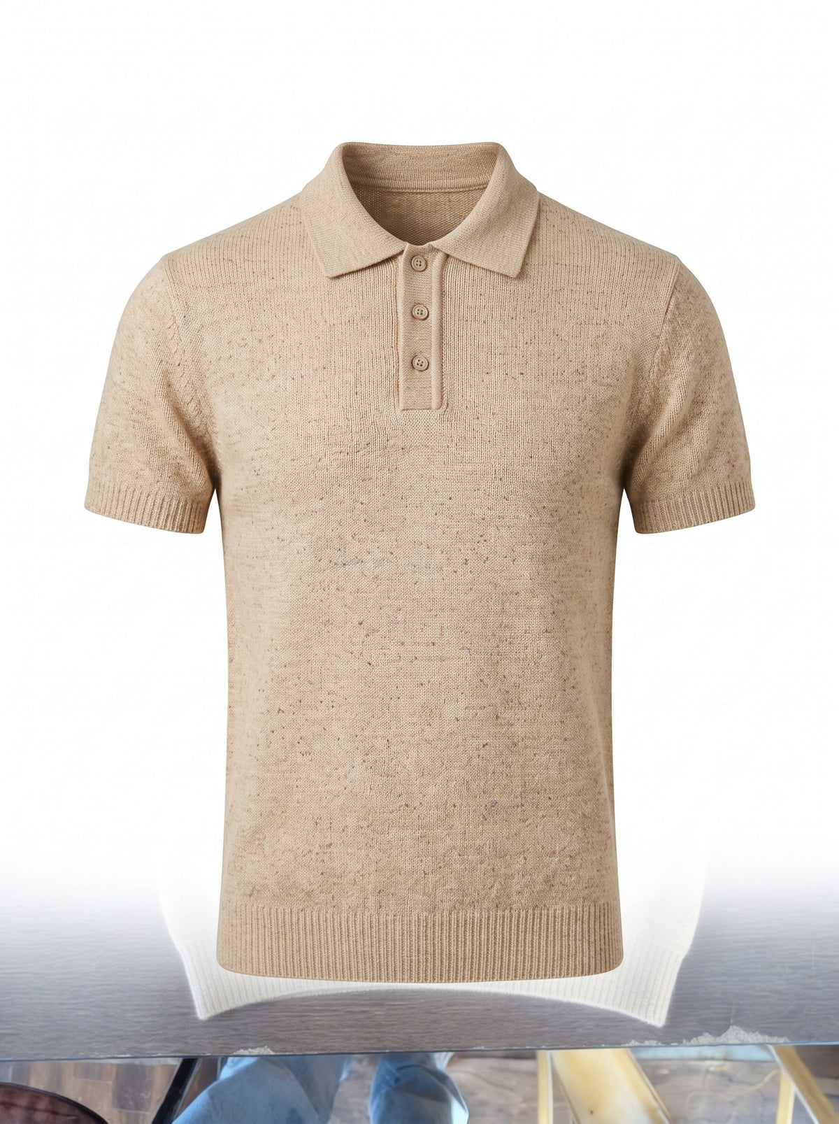 The Weather Report knit polo in flecked oatmeal shown front on, three tonal buttons and ribbed collar